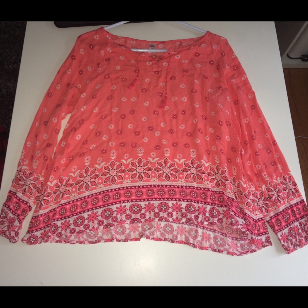 A pink flowy blouse for kids